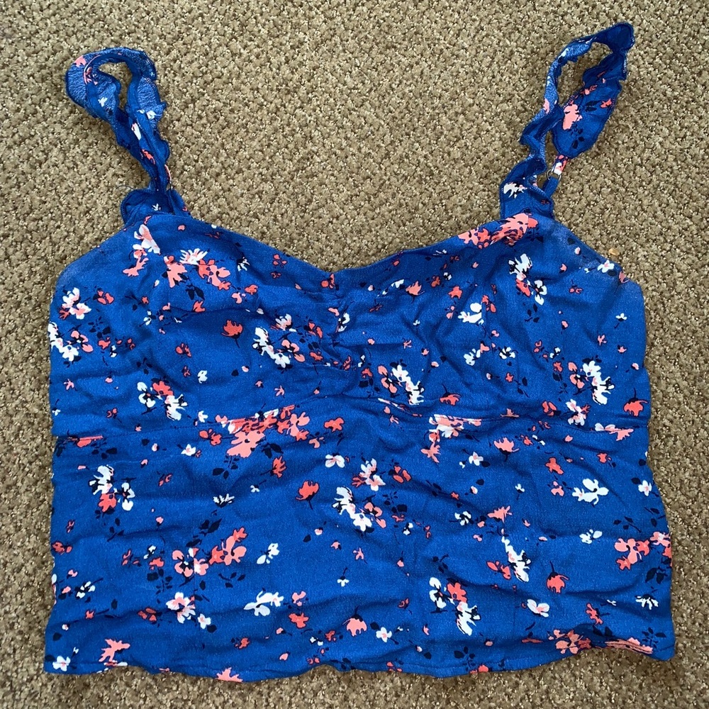 Dark blue corset style crop top with ruffle straps